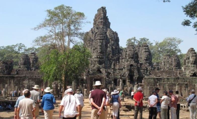 in front of Preah Vihear, where you can observe the relic of a subtle ancient temple made from stones, with many scrulpture of Buddha and deities on them