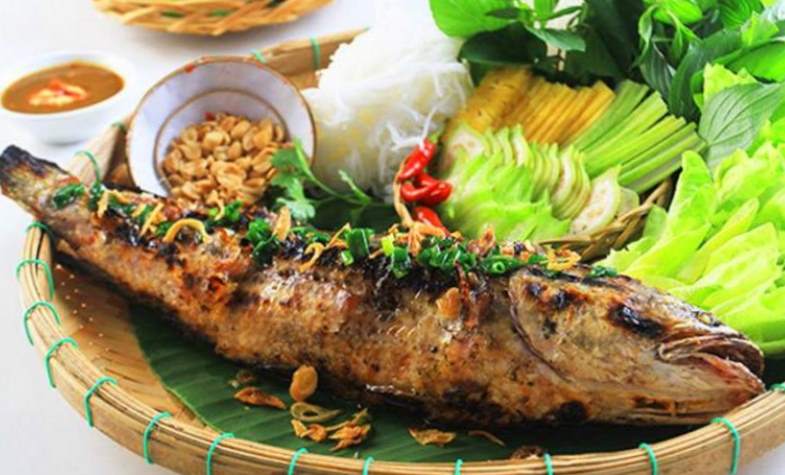 Vietnamese famous La Vong fish cake hot served to customers