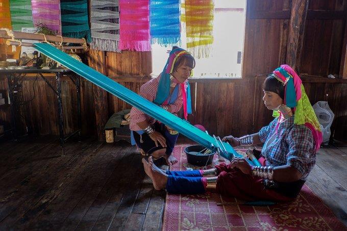Long neck women are weaving